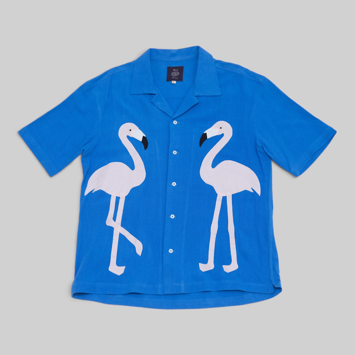 Chemise à col cubain avec motif flamant rose en appliqué