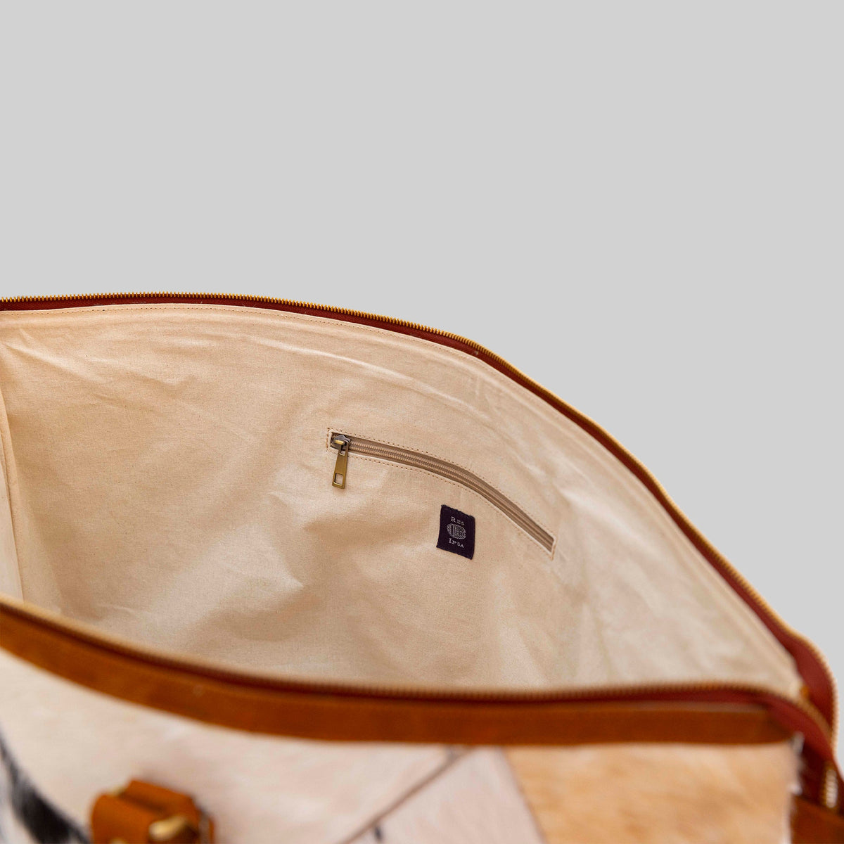 Sac week-end en cuir de vachette